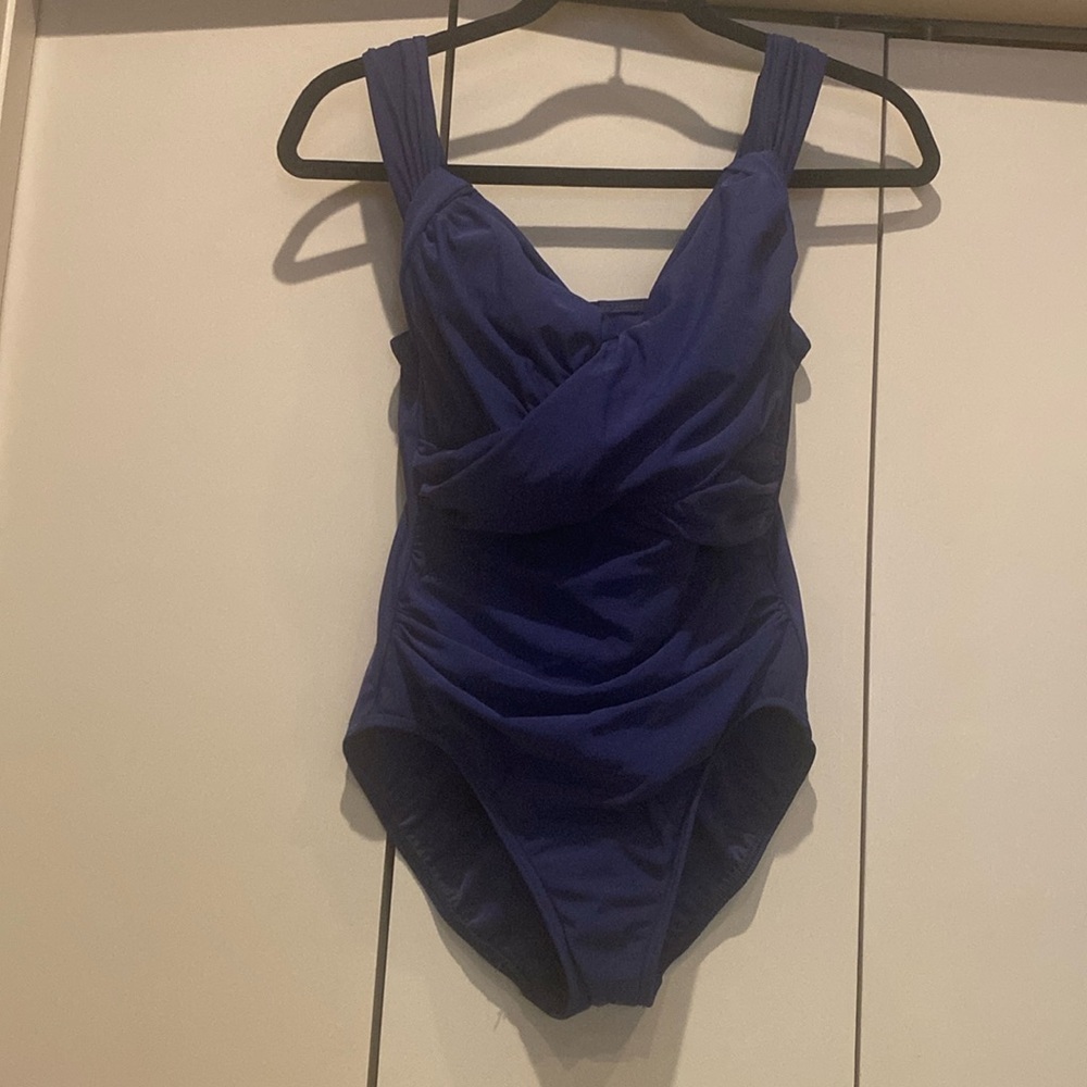 - Lands End one piece swim suit.  Built in bra, size 6P, like new.
